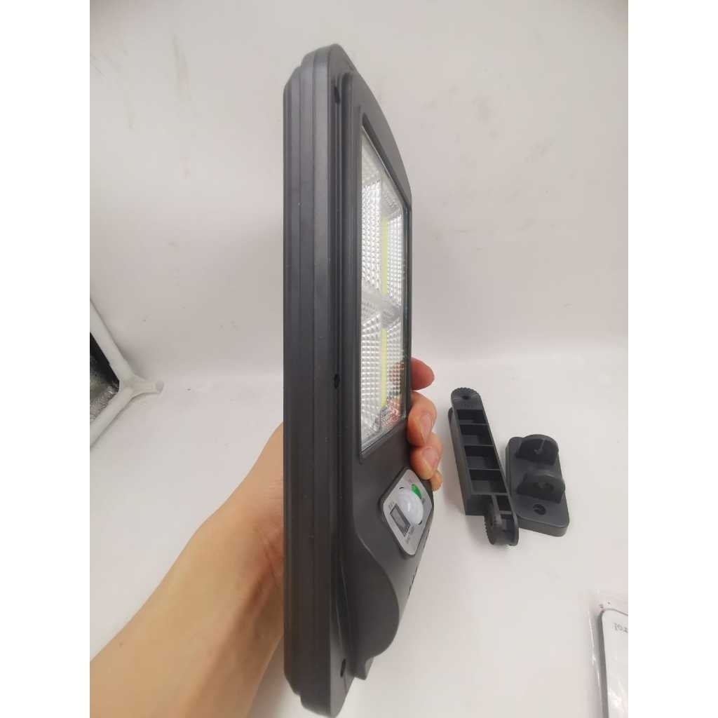 Luminária Solar Poste Rua Parede Refletor  Sensor Presença Movimento Prova D' Água Com Controle 0002